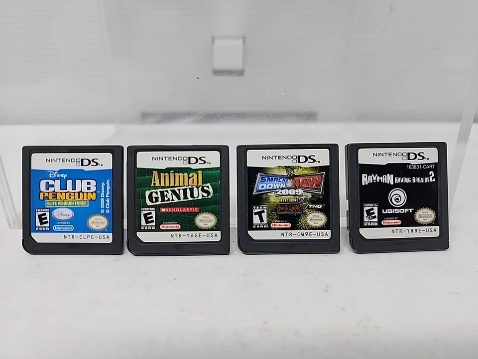 LOT of 4 - WWE Smackdown Vs. Raw 2009, Rayman Raving Rabbids 2, MORE Nintendo DS - Image 1 of 2
