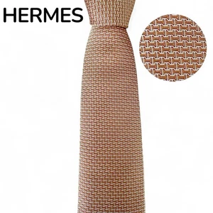 Cravatta jacquard geometrica HERMES 100% seta motivo H fontana arancione - Foto 1 di 9