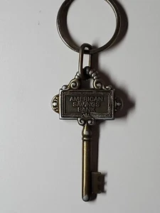 Llavero esqueleto de latón American Savings Bank vintage 2,75" - Imagen 1 de 2