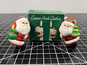 Vela de cerámica navideña vintage escaladores Santa Huggers caja verde Kurt S. Adler - Imagen 1 de 15
