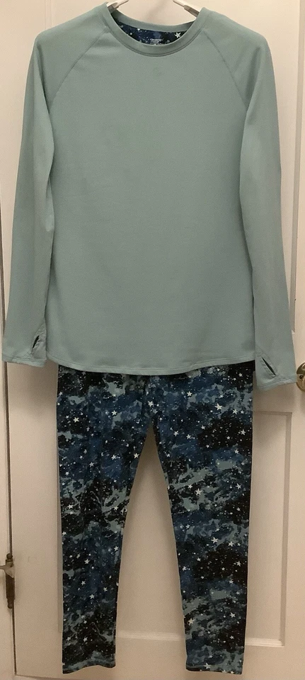 Juego de pijama Cuddl Duds Climate Right de 2 piezas talla M parte superior acuática maciza e inferior cielo estrellado Foto 1 de 4