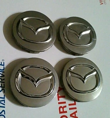 Juego de tapacubos tapacubos cromados Mazda Millenia 2000-2002 OEM TC35-37-190A Foto 1 de 4