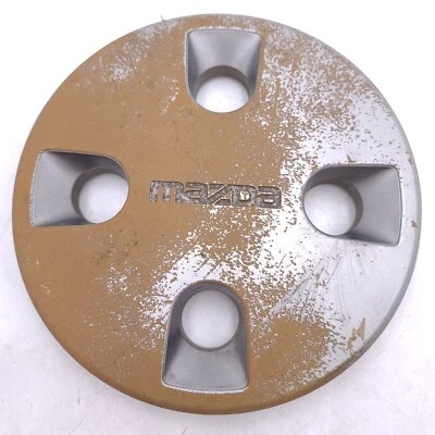 1986 - 1989 年马自达 323 复古车轮中心盖 6778(正品原始设备制造商) — 第 1/4 张图片