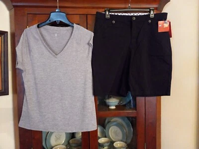 Lote de 2 camisas cortas y nuevas con etiquetas Lees talla 14 precio de venta sugerido por el fabricante $58 nuevas con etiquetas talla grande Foto 1 de 4