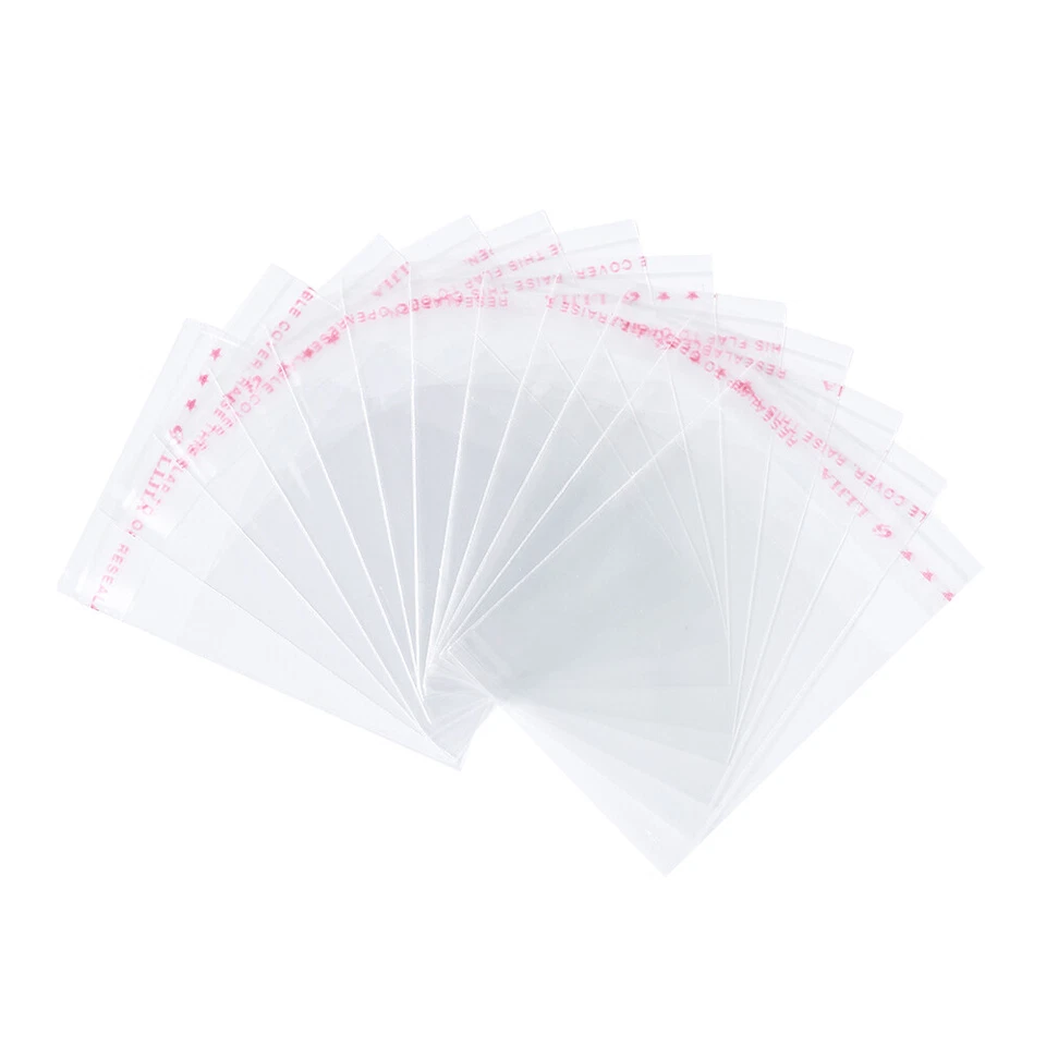 Bolsas de celofán OPP transparentes 1000 piezas bolsas de regalo envoltura joyería embalaje 70x50 mm Foto 1 de 4