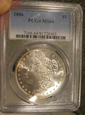 1886 Morgan Silver dollar - PCGS MS 64, Light Peripheral toning 5024 - Image 1 of 2