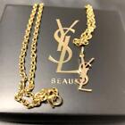 YVES SAINT LAURENT Necklace  Logo Charm With Leather Strap