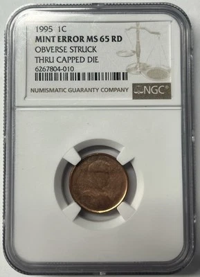 1995 1C OBVERSE STRUCK THRU CAPPED DIE MINT ERROR MS 65 RD NGC - Image 1 of 4