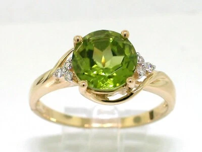 Peridot Ring 585 Gelbgold 14Kt Gold 1 natürlicher runder Peridot  6 Brillanten - Bild 1 von 4