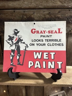 Letrero vintage de cartulina con pintura de sello gris Foto 1 de 4