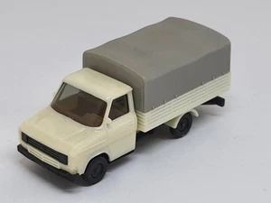 Ford Transit - Pritsche mit Plane von Herpa Modellauto (2g) - Bild 1 von 2