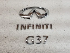 09-13 INFINITI G37 Coupe Trunk Emblems Logo/Infiniti/G37 OEM 84895-JL60A - Picture 1 of 12
