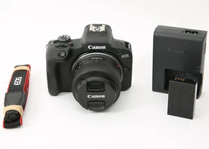 Cámara digital Canon EOS R100 sin espejo con lente de 18-45 mm 24,2 MP, 1000 obturadores - Imagen 1 de 7