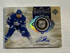 2023-24 Upper Deck Ultimate Auston Matthews Ultimate Emblems Auto 4/25 - Picture 1 of 2