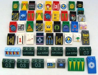 Lote de 50 ladrillos Lego inclinados impresos y pegados en colores y estilos surtidos Foto 1 de 4