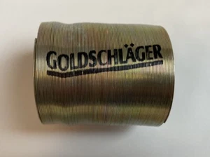 vintage Goldschlager branded Metal Slinky Toy Marketing Decor Man Cave Bar 2" - Picture 1 of 6