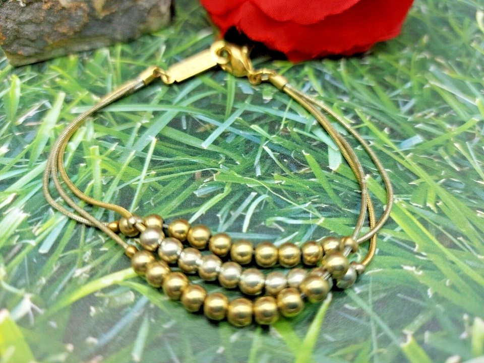 Pulseira Napier assinada tom dourado e prata bolas estacionárias correntes triplas 7" - Imagem 1 de 4