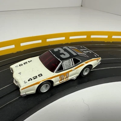 Aurora AFX Mercury Stocker #31 White/Black/Gold Slot Car - Image 1 of 4