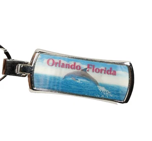 Llavero Orlando Florida Dolphin tono plata metal con imágenes en movimiento - Imagen 1 de 8