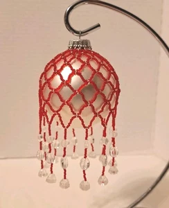 Adorno con cuentas de semillas de árbol de Navidad con cuentas rojas y transparentes - Imagen 1 de 1