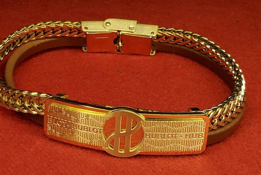 Brazalete brazalete brazalete de cuero trenzado con placa de acero para hombre y mujer Foto 1 de 4