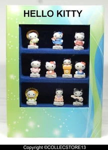 SERIE COMPLETE DE FEVES EN COFFRET HELLO  KITTY - Picture 1 of 2
