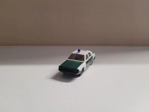 Herpa 1:87 Audi 100 GL 5E Limousine "Polizei" Kennung 1612, grün/weiß - Bild 1 von 2