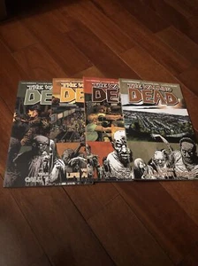The Walking Dead Comics 4 Book Lot Kirkman Adlard Rathburn Vol 16, 20, 24, 26 - Picture 1 of 11
