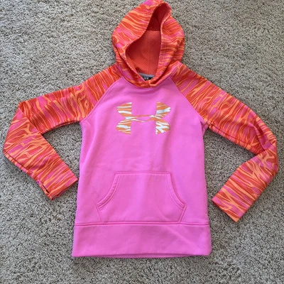 Pullover Under Armour Storm YMD de poliéster con capucha para niña, rosa intenso/naranja Foto 1 de 4