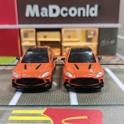 2 PIEZAS ASTON MARTIN DBX 707 COSMOS NARANJA 1/64 COCHE MODELO DIECAST DE POP RACE  Foto 1 de 3