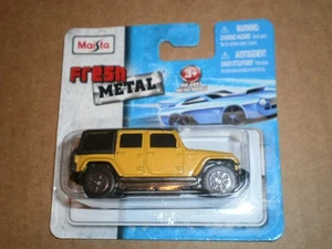 Jeep Wrangler Maisto amarillo metal fresco - Imagen 1 de 3