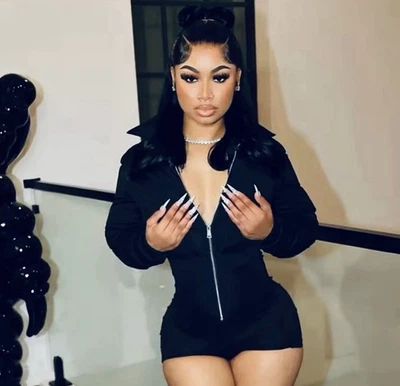 Mono corto abrigo hinchado para mujer Foto 1 de 4