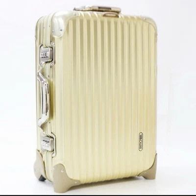Mala de transporte Rimowa Topas 32L dourada 2 rodas usada - Imagem 1 de 4