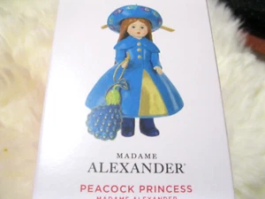 2024 Punze "PFAUENPRINZESSIN" VON MADAME ALEXANDER = LEICHTE BESCHÄDIGUNG AM KARTON - Bild 1 von 1