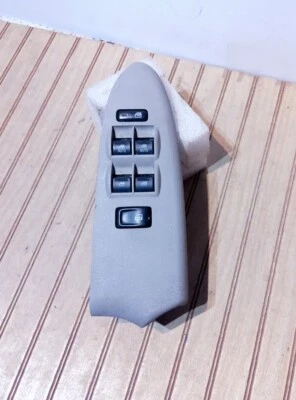 Chevy Trailblazer/06 Trailblazer EXT 2006-2009 interruptor de ventana principal y moldura OEM  Foto 1 de 4