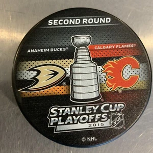 Anaheim Ducks Calgary Flames 2nd Round Stanley Cup 2015 Souvenir Hockey Puck - Picture 1 of 4