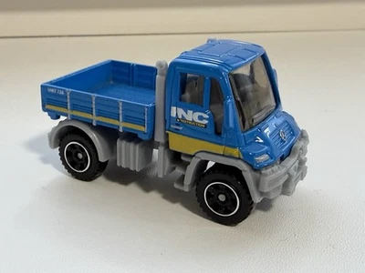 2006 Matchbox Mercedes-Benz Unimog U300 Construction Vehicle Blue Yellow Diecast - Image 1 of 4