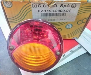 COBO FANALE POSTERIORE TONDO STOP LUCI FRECCIA RIMORCHIO TRATTORE PALA R502 - Foto 1 di 1