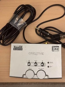24-bitowy zewnętrzny soundblaster Creative Labs model SB0300, bardzo przezroczysty na powierzchni - Zdjęcie 1 z 5