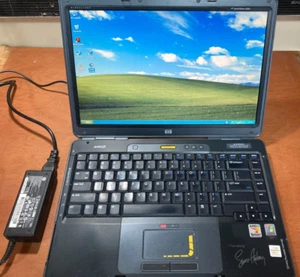 HP LiveStrong Lance Armstrong Special Edition Laptop L2000 Win XP Pro w/Charger - Picture 1 of 18