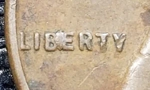 1955-S MINT ERROR  WHEAT CENT Penny ('BIE'  IN LIBERTY) - Picture 1 of 3