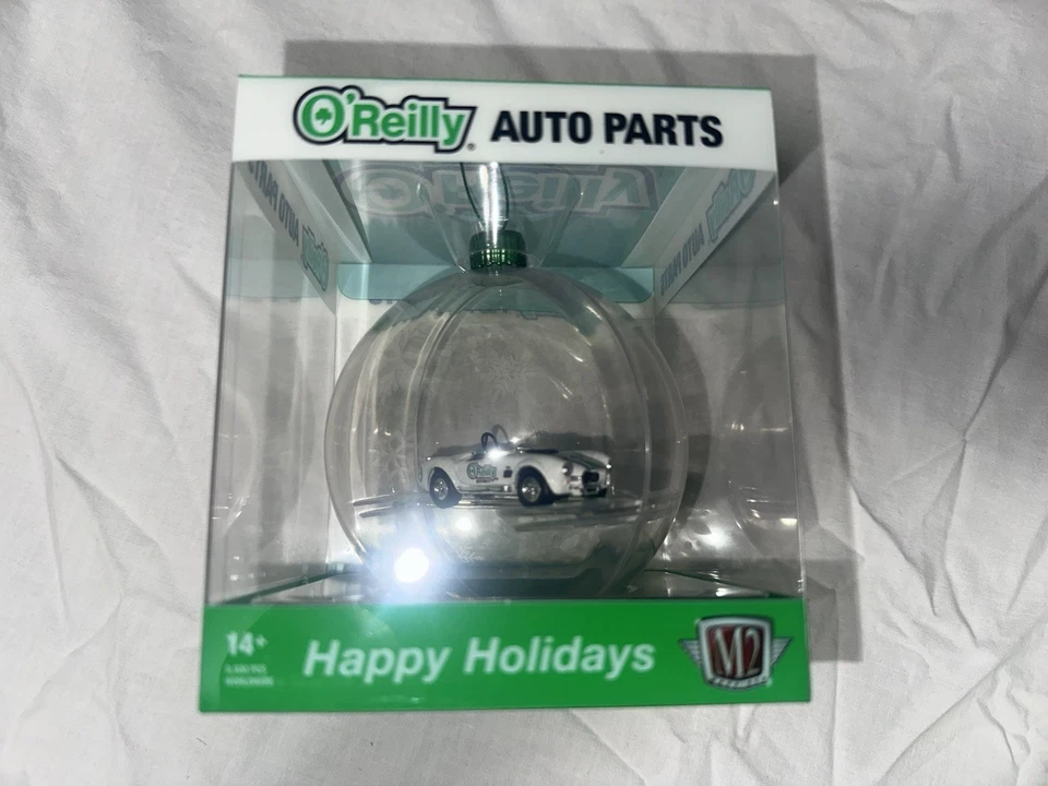 M2 Machines 1965 Shelby Cobra 427 S/C O’Reilly Auto Parts Holiday Ornament 1:64 - Image 1 of 1