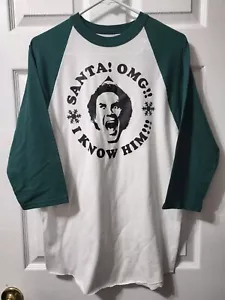 T-shirt film elf ""Babbo Natale! OMG! Io lo conosco!" Divano verde bianco manica a 3/4 - Foto 1 di 9