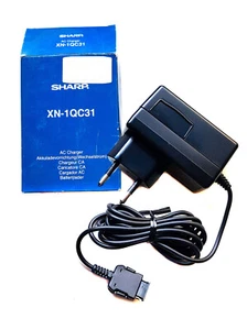 Cargador Sharp original AC Charger XN-1QC31 - Imagen 1 de 2