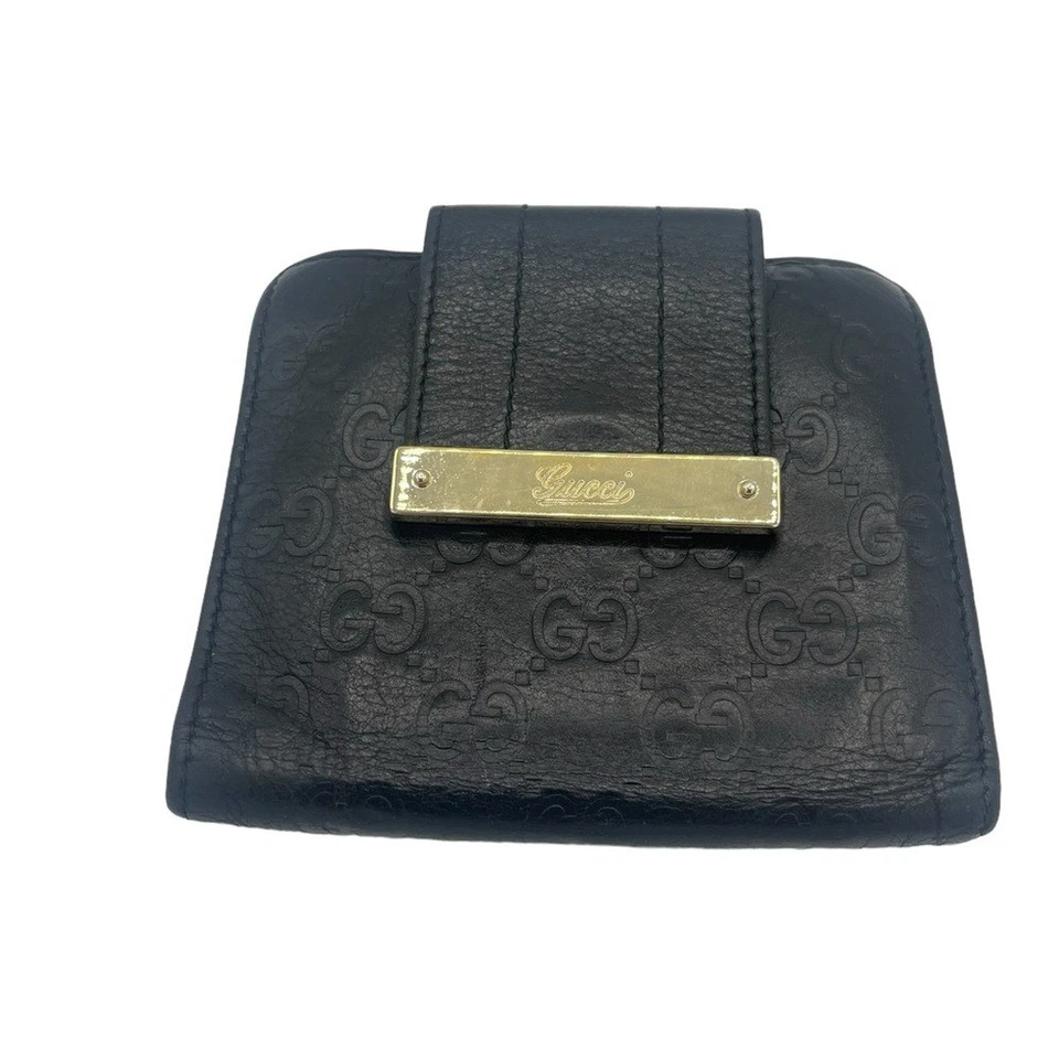 GUCCI Guccissima portafoglio bifold monogrammato o mini tracolla - Immagine 1 di 4