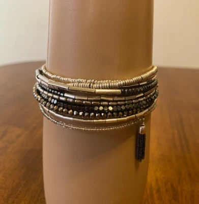 Pulsera envolvente bobina negra Stella & Dot plata y bronce con borlas de cadena Foto 1 de 4