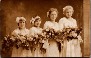 Postcard Vintage Early 1900 Four Young Woman In Line Dresses Flowers Formal - Picture 1 of 2
