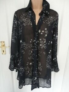 Starry Blue blouse with neck tie, flute sleeves.. Size S.UK10