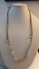 24" Long Thin Leather Necklace With 6" Strand Of Light Colored Accent Beads.