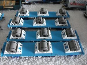 HO AUSCISION NCOX FLAT CARS WITH CRADLES AND   LOADS X 4